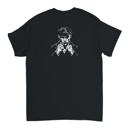 Man in fighting stance with his guard up and an intense, aggressive gaze – dynamic back print on Combat Core Gear t-shirt